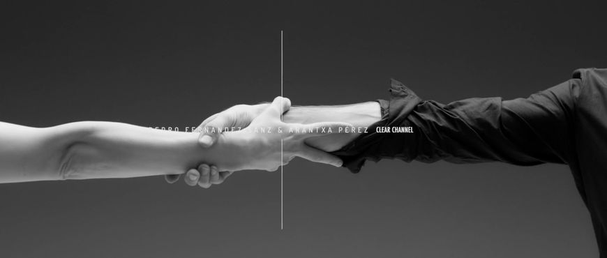 IMAGE: Still – typography example, arms held